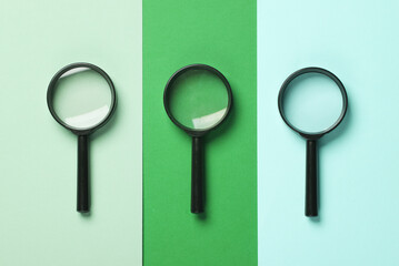 Set of magnifiers on colored background