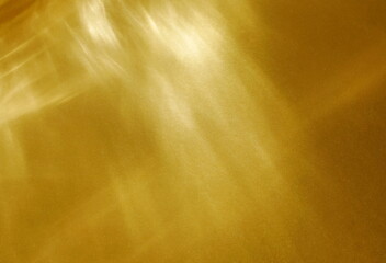 Abstarct sunlight shadows gold background mockup for design and product presentation with copy space. Shine reflection template, wallpaper.