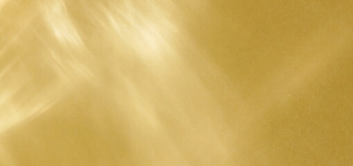 Abstarct sunlight shadows gold background mockup for design and product presentation with copy space. Banner. Shine reflection template, wallpaper.