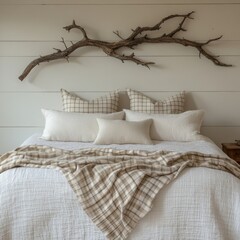 Rustic wooden branch wall decor over bed with white pillos and beige plaid. Farmhouse, country interior design of modern bedroom, Generative AI