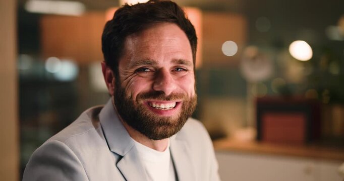 Face, night and man in office with laugh, business and finance in company. Happy, corporate and broker in workplace with confidence, space and professional working late for monthly target deadline.