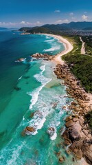Aerial view of a beautiful coastline with turquoise water and a sandy beach