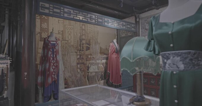 Colorful Traditional Outfits Displayed in Historical Setting