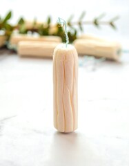 Single tampon on marble surface