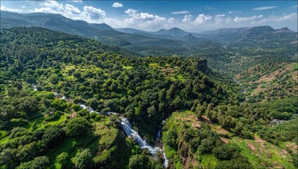 Lush mountain valley with waterfall (1)