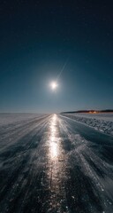 Fototapeta premium Night road on frozen lake under a bright moon
