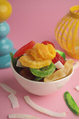 Colorful mix of dried fruits and candies in a bowl
