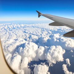 Obraz premium Airplane window view of clouds