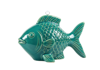 Isolated turquoise ceramic fish figurine ornament for decoration, feng shui symbol