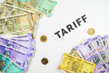 Stacks of Indian Currency with Coins Showcasing Financial Concept and Tariff