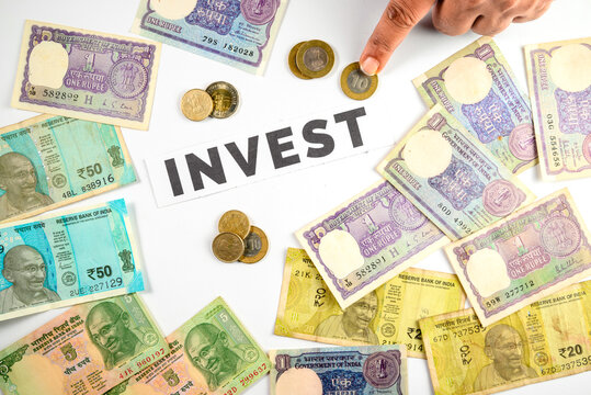 Indian Currency Coins and Notes Displayed with Investment Concept