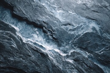 Obraz premium Textured dark slate rock face