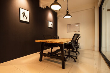 small meeting room with four chairs