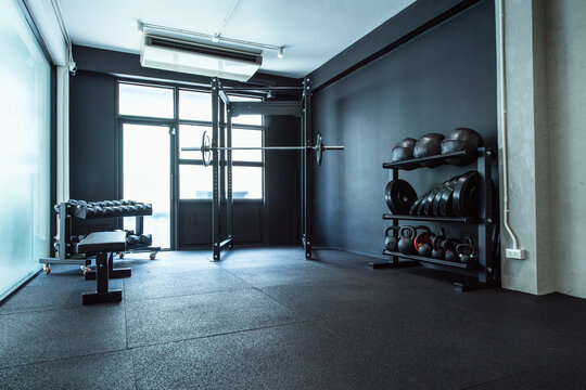 empty gym with workout equipment in Bangkok