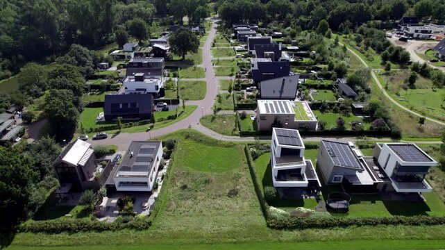 Luxury houses in neighbourhood in Zutphen, The Netherlands, with contemporary architecture. Engineering and infrastructure in Holland