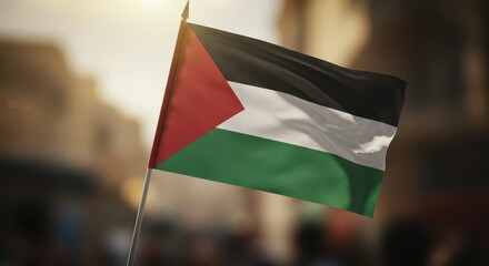 Symbol of Identity: A vibrant Palestinian flag proudly waves against the backdrop of a bustling street scene, bathed in the warm glow of natural light.
