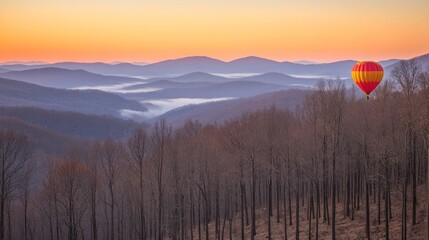 Hot air balloon ascends over serene forest landscape during a vibrant sunrise adventure