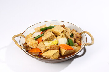 Handmade Tofu Vegetable Stew with Cabbage and Carrots in Traditional Pan