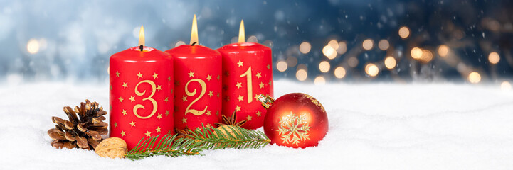 Third 3rd Sunday in advent with burning candle Christmas time panorama winter with copyspace copy...
