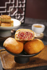 Traditional Ham-Filled Mooncakes for Mid-Autumn Festival Celebration with Tea Service
