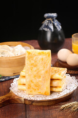 Handmade Golden Potato Pancakes with Fresh Ingredients on Rustic Kitchen Table