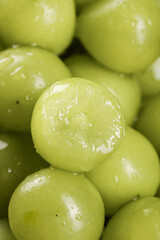 Fresh Green Grapes with Water Droplets from Guizhou Market - Crystal Clear Fruit Texture Close-up
