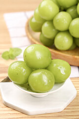 Fresh Green Grapes from Yunnan Guizhou China in White Bowl with Crystal Dewdrops Seasonal Fruit Display