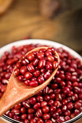 Fresh Red Adzuki Beans from Guizhou Province China in Bowl with Wooden Spoon