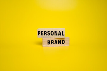 personal branding words text on wooden blocks on yellow background