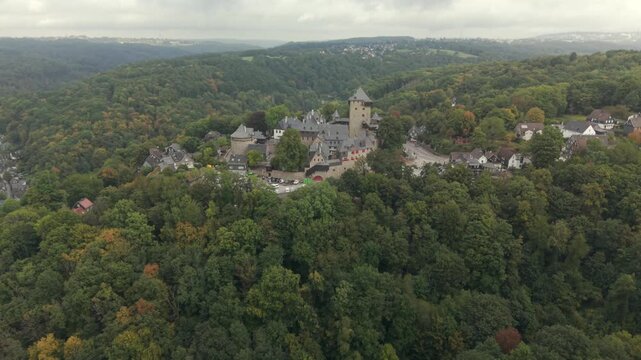 Castle Burg at Solingen region with a drone fly over during Autumn time window