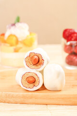 Handmade Specialty Sandwich Rolls with Dates and Milk Filling on Wooden Board