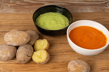 Red mojo rojo and green mojo verde sauces, traditional Tenerife dips, mojo picon dressing