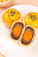Chinese Mooncakes with Egg Yolk and Red Bean Paste Filling Traditional Asian Dessert