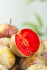 Fresh Red-Fleshed Plums at Orchard Market Display - Ripe Summer Stone Fruit Harvest