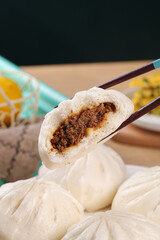 Handmade Steamed Pork Buns with Savory Filling Served Fresh Asian Dumplings