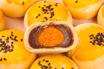 Chinese Mooncakes with Egg Yolk and Red Bean Paste Filling Traditional Asian Dessert