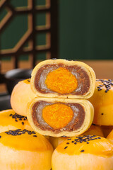 Traditional Chinese Mooncakes with Egg Yolk Centers and Sweet Bean Paste Filling Cross Section