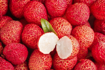 Fresh Lychee Fruits from Lingshan Hainan China - Tropical Asian Fruit Display with Peeled Lychee Showing White Flesh