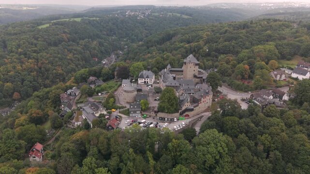 Castle Burg at Solingen region with a drone fly over during Autumn time window