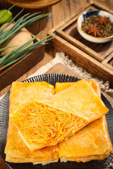 Handmade Sweet Potato Pancakes with Shredded Filling on Rustic Wooden Table