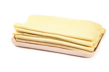 Fresh Handmade Tofu Sheets Raw Soy Product Stacked on Pink Plate White Background