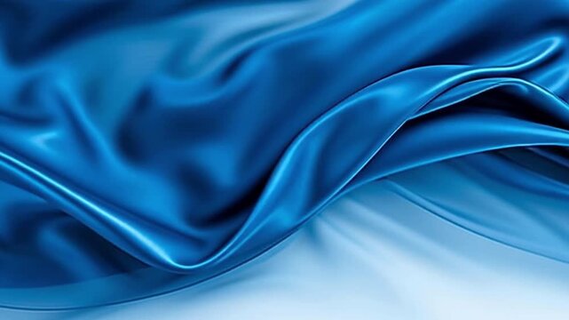 Close Up of Smooth Flowing Blue Silk Fabric with Shiny Texture Creating Luxurious and Elegant Appearance