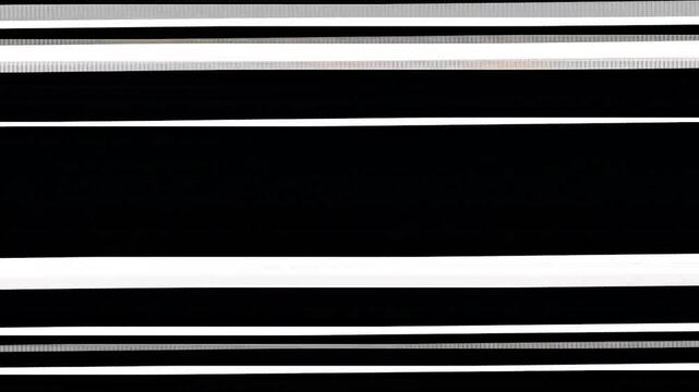 Alternating stark black and white bands