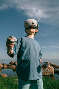 People in virtual glasses with joysticks plays