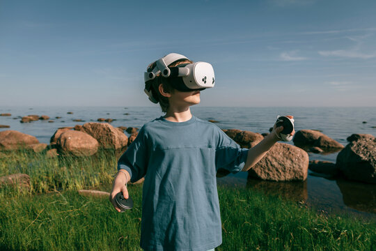 Man in virtual glasses in nature close-up