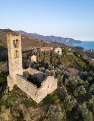 Fototapeta premium Ruined church atop a hill overlooking the sea