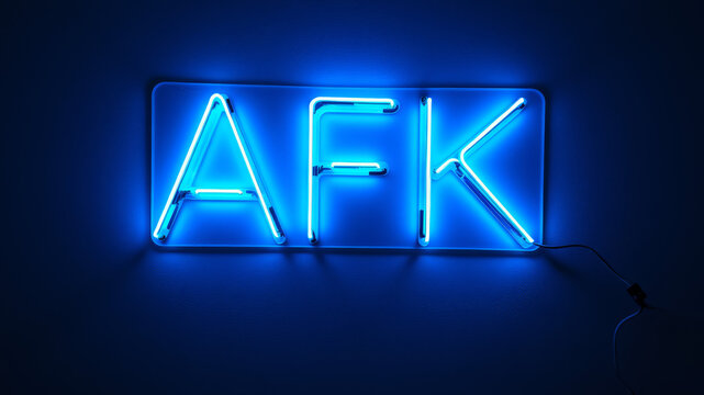 AFK glowing blue on wall in minimalist gaming-themed space