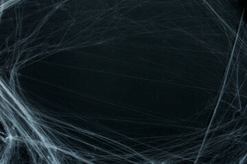 close up spider's web on retro vintage dark black color background for halloween night party design concept concept