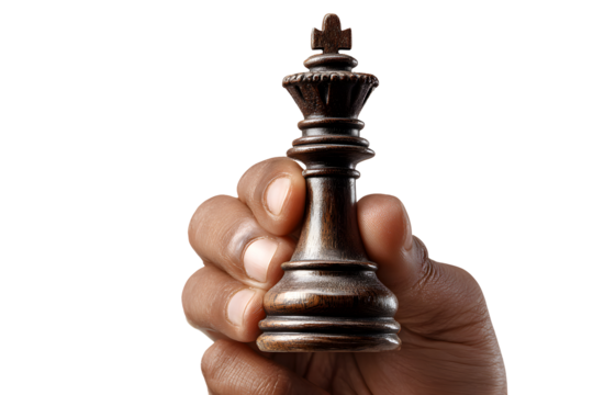 Hand holding a black king chess piece isolated on transparent background