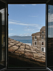 Scenic Window View of Seaside Landscape